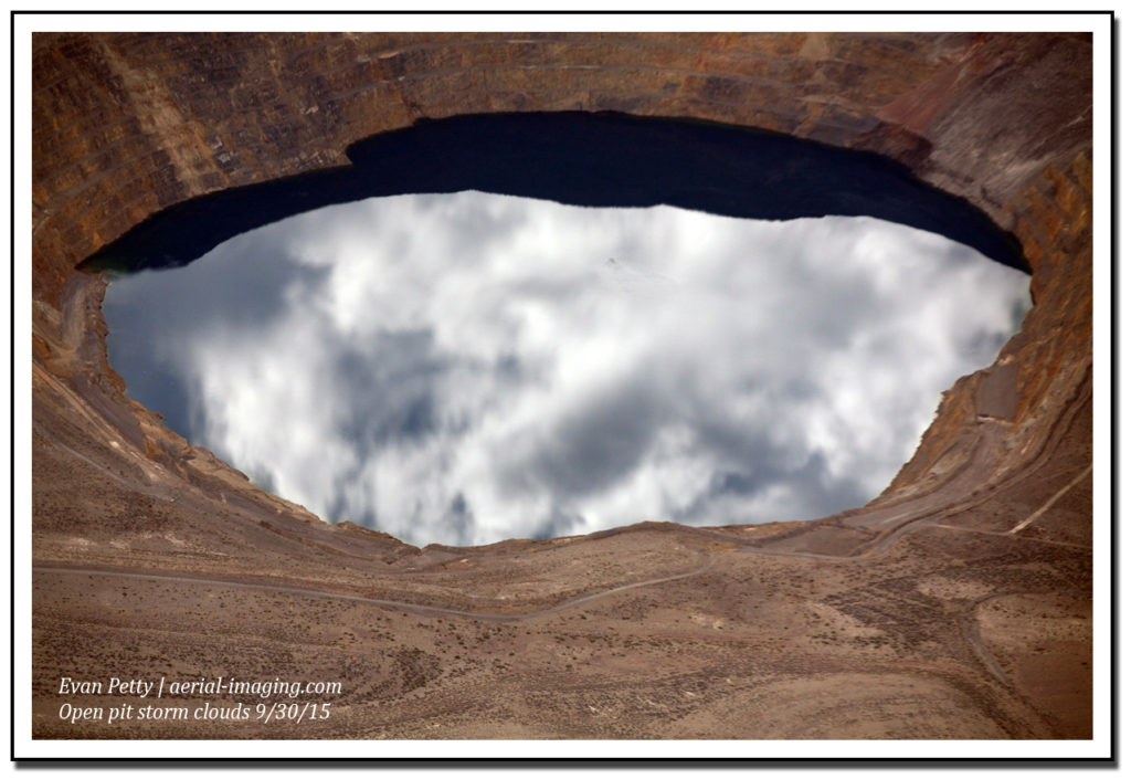 Aerial Clouds Above Open Pit Mine