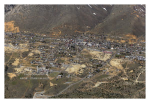 Medium wide aerial view of Downtown Virginia City, Nevada aerial image photograph print view